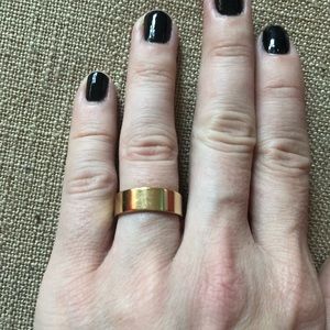 Gold colored ring (band) size 7